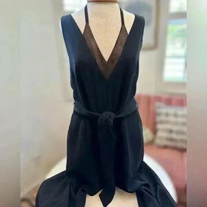 123 Paris bod conscious jumpsuit with bronze inlay. Side pockets, deep V back.